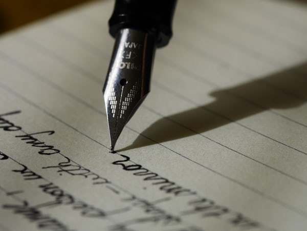 Pen Writing Letter